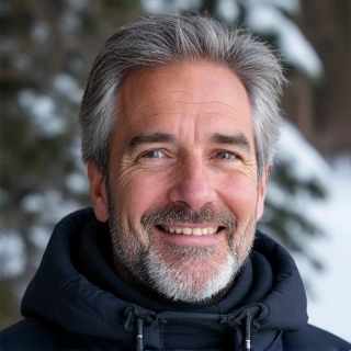 Portrait of a man, David Lee, looking knowledgeable about winter sports gear